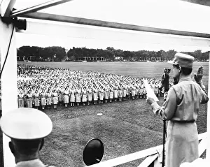Wacs Prints: Col. Oveta Culp Hobby administering the Army oath to several thousand women