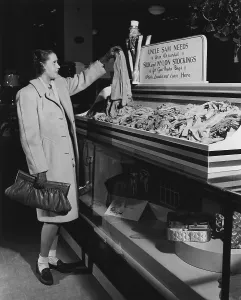 Shortages Prints: Collection point for worn out silk stockings during World War 2