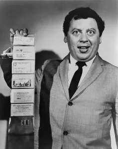 Debt Prints: Comedian Marty Allen, holding wallet with four credit cards