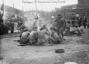 Brooklyn Prints: Coney Island, Filipinos in loin cloths sitting in circle together at Dreamland