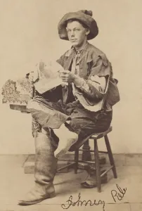 Studio Portrait Prints: Confederate prisoner of war wears a tattered and worn uniform