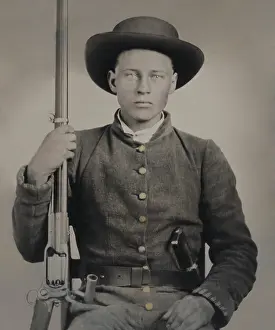 Studio Portrait Prints: Confederate soldier in uniform with a Colt Revolving rifle and D-Guard Bowie knife