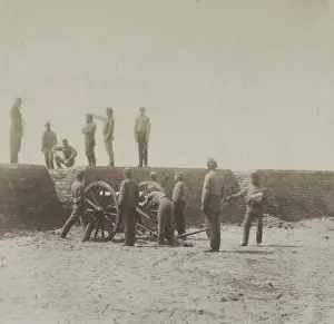 Shelling Prints: Confederate soldiers man cannon in an artillery battery near Charleston, SC in 1861