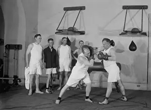 Exercise Prints: Congressional boxing match with spectators at the House Gymnasium in the Capitol