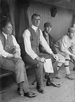 Connie Prints: Connie Mack, manager of the Philadelphia Athletes in a dugout during a 1915 game in Washington
