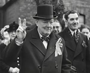Lcgr1501 Prints: Conservative Party Leader Winston Churchill gives his familiar victory sign