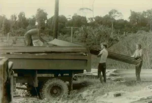 Communes Prints: Construction Workers and Bobby Stroud (middle) and others unloading a truck