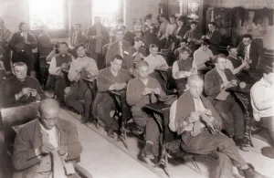 Reform Prints: Convicts knitting in one of their classrooms at Sing Sing Prison in 1915