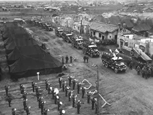 Trucks Prints: Convoy carrying former Chinese POWs leaving Ascom Village