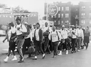 Images Dated 8th May 2008: CORE members swing down Fort Hamilton Parkway