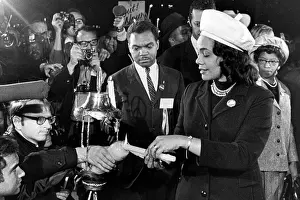 Civil Rights Prints: Coretta Scott King lights candle at anti Vietnam War rally