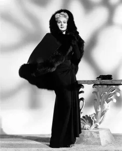 Jean Louis Prints: THE CORPSE CAME C.O.D. Adele Jergens, in a dress and cape by Jean Louis, 1947