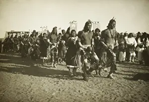 Dance Prints: Costumed Jemez Pueblo Indians perform a ceremonial dance