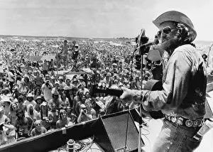 Crowd Prints: Country rock singer Willie Nelson opening the July 4th Picnic music festival
