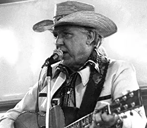 Straw Hat Prints: Country western singer DAVE DUDLEY performing live