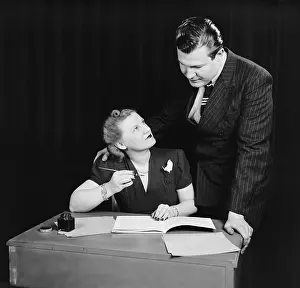 Stock Prints: Couple working out budget, ca. 1940