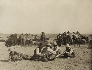 Amusements Prints: Cowboys playing mumbly peg during a break at the Turkey Track Ranch in Texas in 1906