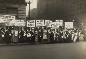 Social Movements Prints: Crowd of women's suffrage supporters demonstrating with signs reading