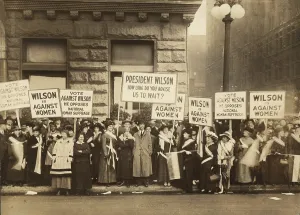 Social Movements Prints: Crowd of women's suffrage supporters demonstrating with signs reading