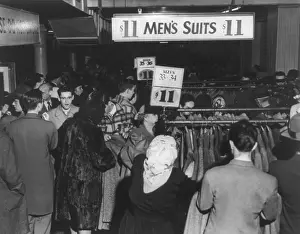 Sales Prints: Crowded Boston department store where men's suits and top coats were on sale for $11