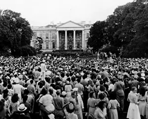 Images Dated 16th May 2007: Crowds gathered around the White House after hearing that about Japan's surrender in World War II