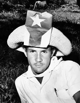Cuban Patriot wearing a flag decorated hat