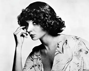 1970s Hairstyles Prints: The Curly Locks No. 1 hairstyle by Pierre and Michel is a frame do with a perm that curls only the ends