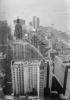 Financial District Prints: Curved top of the Singer Tower from the Woolworth Building in downtown Manhattan, c. 1920