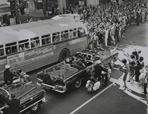 Texas Prints: Dallas crowds waving as President Kennedy's limousine drives through downtown Dallas