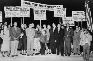 2008 2 Prints: Dalton Trumbo (1905-1976) surrounded by supporters with signs