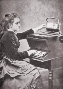 Typewriters Prints: The daughter of inventor Christopher Sholes writing on one of his experimental typewriters in 1872