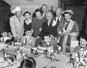 Mamie Prints: David Eisenhower blows out the candles on his birthday cake