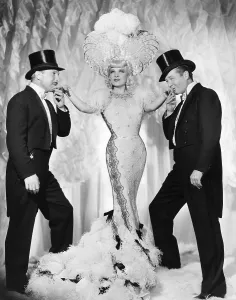 Lowe Prints: EVERY DAY'S A HOLIDAY, from left, Lloyd Nolan, Mae West, Edmund Lowe, 1937