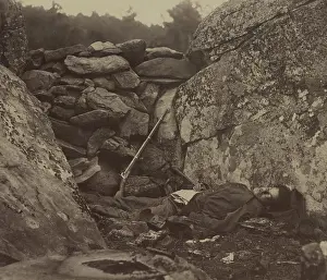 Alexander Prints: Dead Confederate soldier lies in the Devil's Den