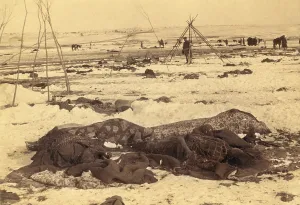 Shot Prints: Several dead Lakota Sioux are wrapped in blankets after the Wounded Knee Massacre of Dec