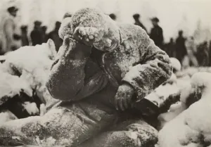 Frozen Prints: Dead Russian soldier sitting, covered with a dusting of snow