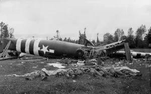 Paratroopers Prints: Eight dead U.S. paratroopers lie beside their destroyed Horsa glider in a Normandy pasture