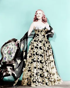 Strapless Gown Prints: Deanna Durbin in flowered strapless evening dress designed by Howard Greer, 1946