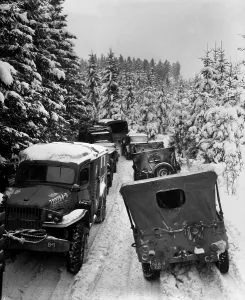 Belgium Prints: Deep snow banks on a narrow road halt military traffic in the woods of Wallerode