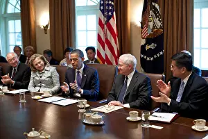Gates Prints: Defense Secretary Robert Gates receives cabinet applause after assassination of Osama Bin Laden
