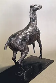 DEGAS, Edgar (1834-1917). Caracoling Horse. Figure made in red wax. In three of the legs the framework appears. Impressionism. Sculpture