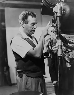 Businessman Prints: Desi Arnaz at a camera as executive producer of I LOVE LUCY TV series from 1952-57