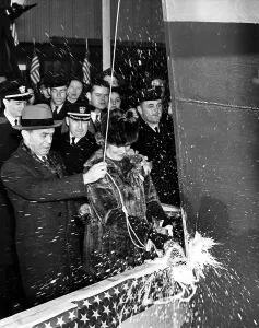 Launch Prints: Destroyer USS Farenholt launched with champagne in Staten I