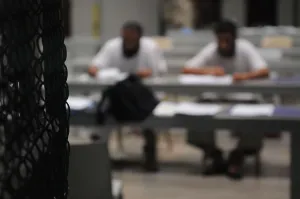 Detainees Prints: Detainees attend a class at Camp Delta military prison on Guantanamo Bay Naval Station
