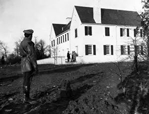 Kidnapped Prints: Detectives examining the back porch of the house from which the baby of American pilot Charles Lindbergh was kidnapped