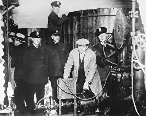 Lcgr1606 Prints: Detroit police inspecting equipment found in a clandestine underground brewery