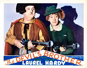 Hardy Prints: THE DEVIL'S BROTHER, US lobbycard, from left: Oliver Hardy, Stan Laurel, 1933
