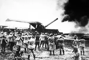 Anonymous Group Portraits Prints: Discharge of a huge French World War I cannon as the projectile left for the German lines