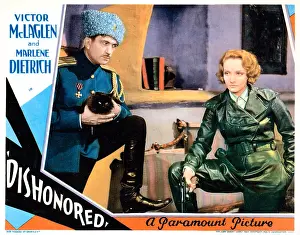 Films By Josef Von Sternberg Prints: DISHONORED, lobbycard, from left: Victor McLaglen, Marlene Dietrich, 1931