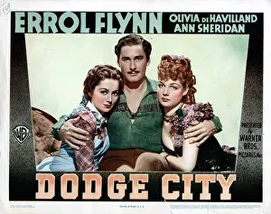 Arms Around Shoulders Prints: DODGE CITY, from left, Olivia de Havilland, Errol Flynn, Ann Sheridan, 1939